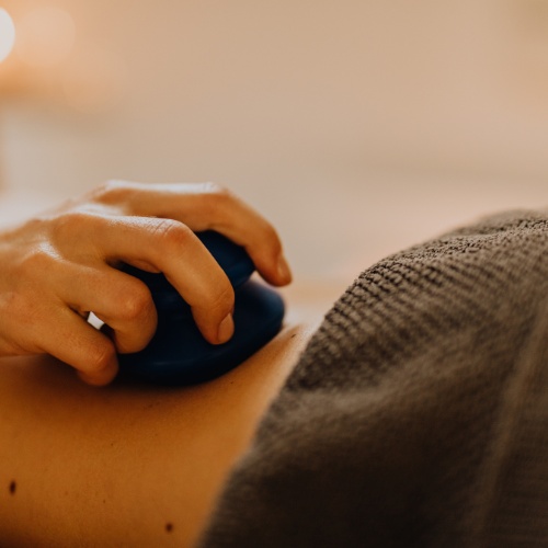 gua sha massage on back